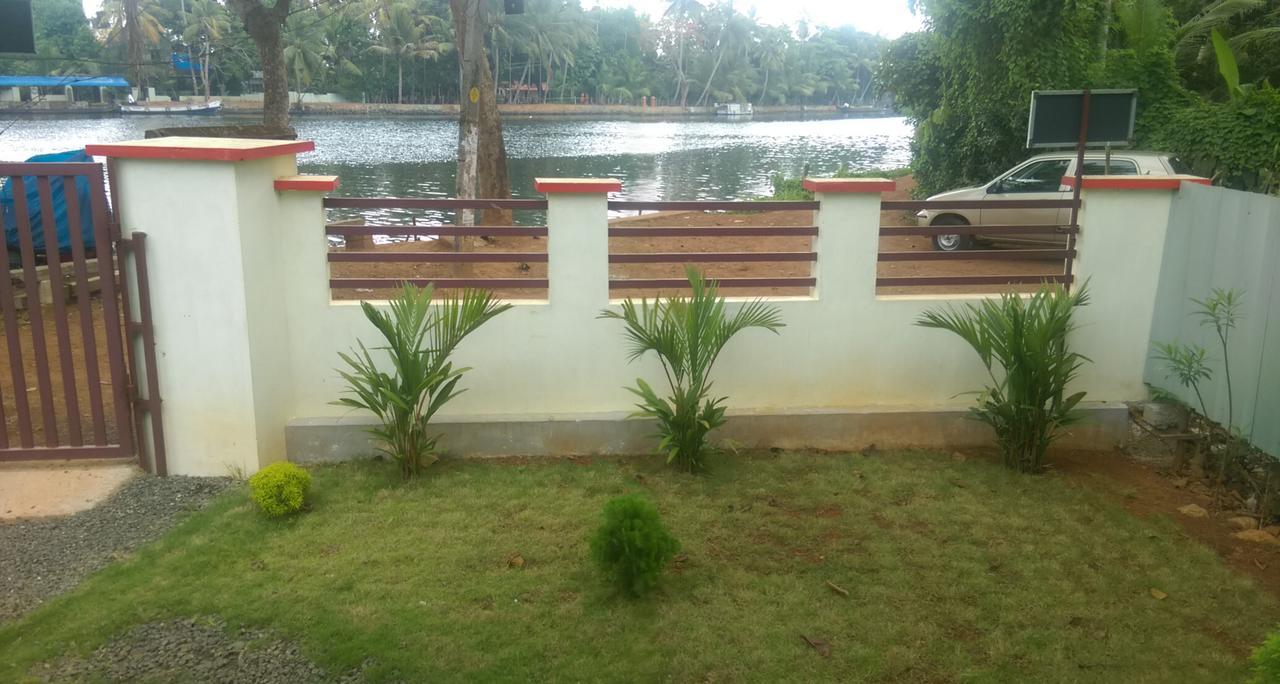 Punerjeni Homes Alappuzha Exteriör bild